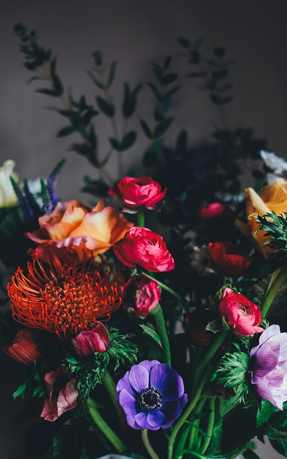 assorted petaled flowers centerpiece inside room